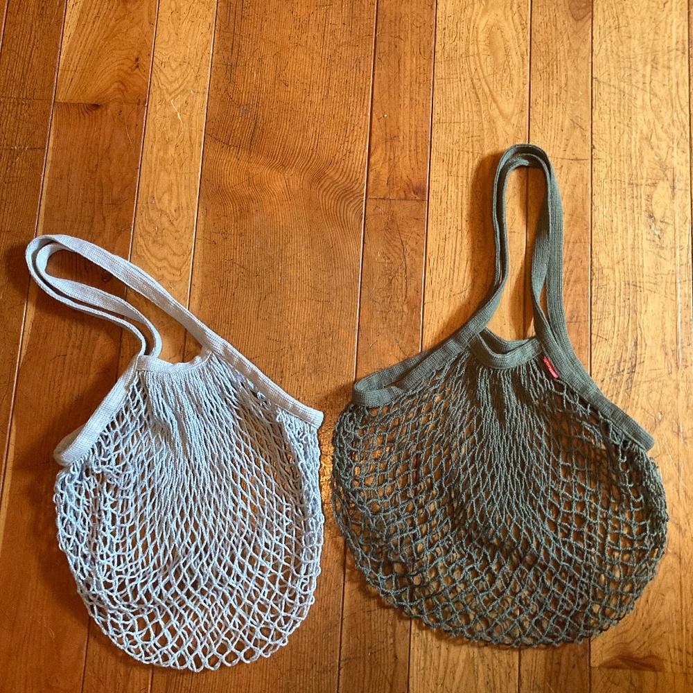 Bundle of two cotton mesh bags green and blue.